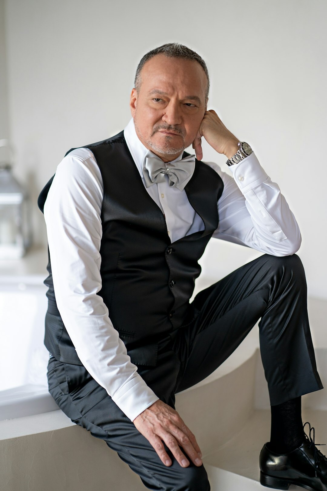 Portrait of a Czech male senior moderator with glasses and beard