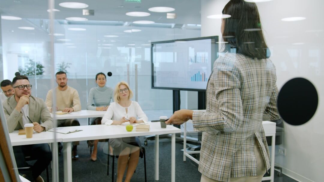 woman leading business presentation